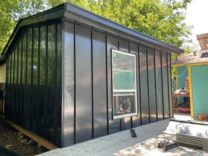 Black standing seam metal wall panels for Metal Roof Installation in Sanford