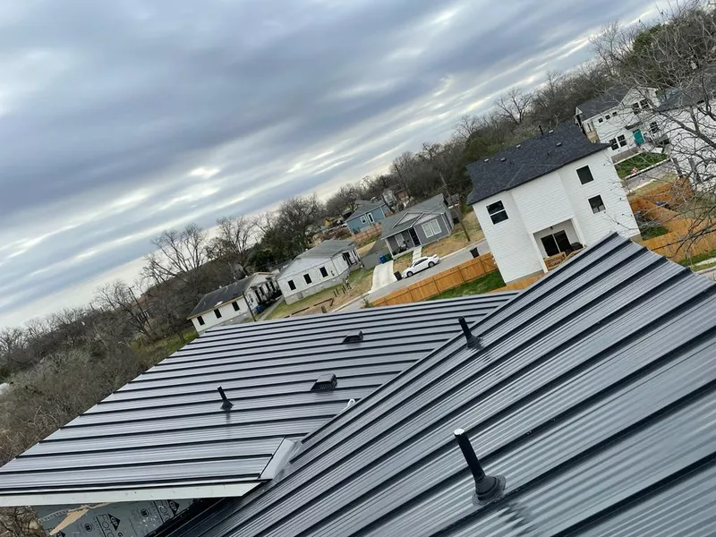 Standing seam metal roof panels with vents for Skylight Repair in Sanford